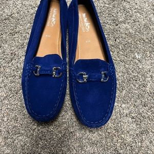 Coach and four loafers
